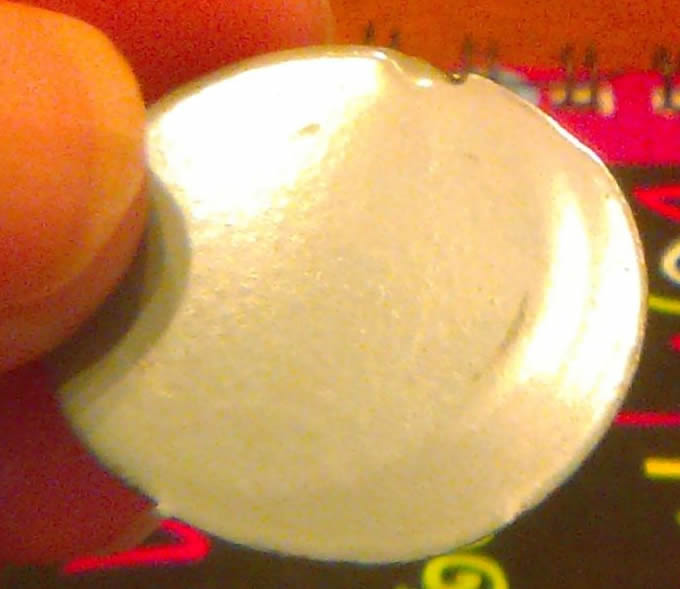 Nickel-Stuck-On-Quarter?